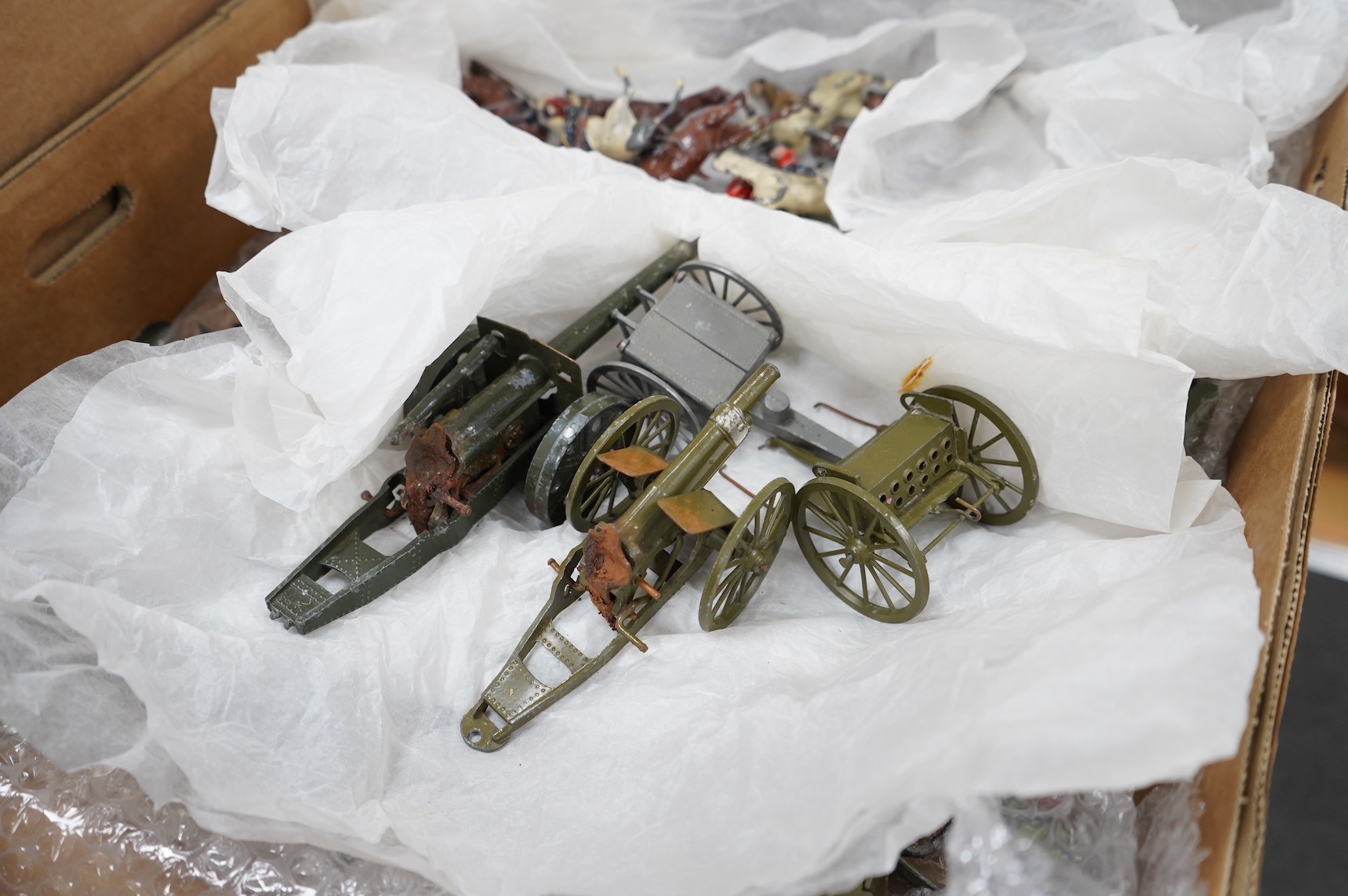 A quantity of Britains lead soldiers, including some pre-war examples, comprising twenty mounted soldiers including lancers, hussars, guards, etc. a quantity of foot soldiers including guards, bandsmen, Highlanders, Scot